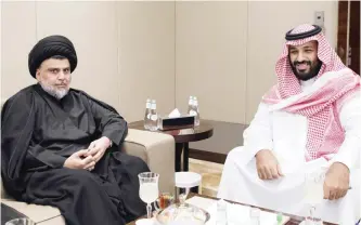  ??  ?? JEDDAH: Saudi Crown Prince Mohammed bin Salman (right) receives prominent Iraqi Shiite cleric Moqtada AlSadr yesterday. — AFP