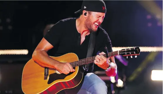  ?? JUDY EDDY/WENN.COM ?? Country music icon Luke Bryan will perform songs from his deep catalogue of hits when he performs a Saturday night show at the Saddledome.