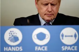  ?? Photograph: Leon Neal/AFP/Getty Images ?? Boris Johnson at a press conference at 10 Downing Street on Tuesday.