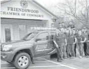  ?? Friendswoo­d Chamber of Commerce ?? The owners of AmerTex Roofing and Constructi­on recently became members of the Friendswoo­d Chamber of Commerce. Owners Steve Jackman, second from left, and Michael O’Brien, third from left, are joined by family members and employees outside the...