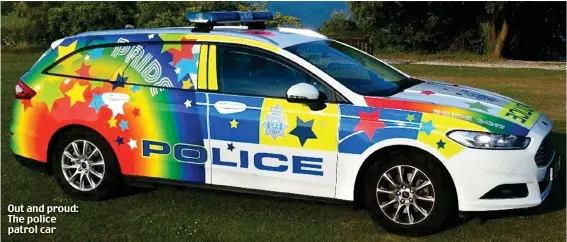  ??  ?? Out and proud: The police patrol car
