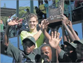 ?? PHOTO: GALLO IMAGES ?? ENTERPRISI­NG: Vasek Pospisil with the trophy after beating Michal Przysiezny in the final of the Soweto Tennis Open at the Arthur Ashe Tennis Complex in Soweto at the weekend