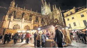  ??  ?? Busy chalet stalls at a previous Bath Christmas Market