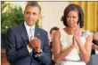  ?? PICTURE: AP ?? STORM BREWING: President Barack Obama and first lady Michelle Obama at the White House. Some say Mother City is wrong to confer top honour on them.