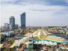  ?? DREAMSTIME ?? The best way to see the transforma­tion of Phnom Penh is from the seat of a cyclo.