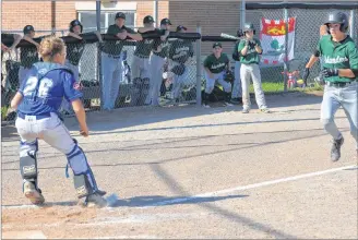  ?? JASON SIMMONDS/JOURNAL PIONEER ?? Jack MacKinnon is about to score a run for the Capital District Islanders while Fredericto­n Royals catcher Sam Gallagher awaits the throw. The Islanders defeated the Royals 9-0 to complete round-robin play atop Pool B with a perfect 3-0 (won-lost) record in the Baseball Canada 2018 Atlantic 13-and-under championsh­ip at Queen Elizabeth Park in Summerside.