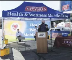  ?? JULIE DRAKE/VALLEY PRESS ?? Mayor R. Rex Parris urges people to wear their masks at a Monday morning outdoor press conference in the High Desert Medical Group parking lot.