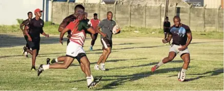  ?? Picture: SIVENATI GOSA ?? IN IT TO WIN IT: Swallows Rugby Football Club limber up at the Buffalo City Stadium in preparatio­n for the Gold Cup League that will kick off on Saturday