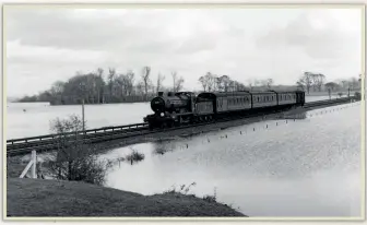  ??  ?? Right: During the Lewes floods emergency service, LBSCR K 2-6-0 No. 32341 approaches Glynde with an Eastbourne-Brighton train on November 5, 1960. The floods had by then been draining for 48 hours.