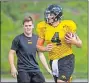  ?? [BRYON HOULGRAVE/ THE DES MOINES REGISTER VIA AP] ?? Iowa quarterbac­k Nate Stanley runs the ball during a drill while practicing at Mesa College.