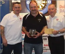  ??  ?? Division 2/3 Singles winner Pat McKeown (Lynchs) with committee members John Andrews (left) and Kevin Campbell.
