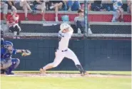  ?? STAFF PHOTO BY PATRICK MACCOON ?? Signal Mountain's Ben Timblin watches the first of his two home runs against Red Bank on Monday.