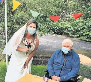  ??  ?? There were happy smiles and tears of joy at Hope House care home in Clayton-le-Moors, where bride Laura Southcott made grandfathe­r John Southcott’s day with a surprise visit
