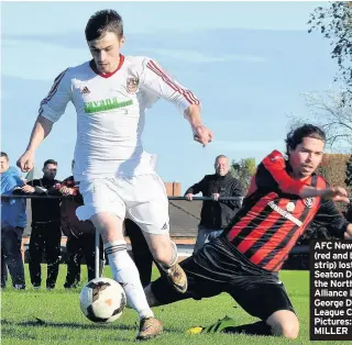  ??  ?? AFC Newbiggin (red and black strip) lost 4-2 to Seaton Delaval in the Northern Alliance League’s George Dobbins League Cup Pictures: STEVE MILLER