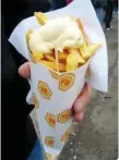  ??  ?? Tasty: A cone of frites