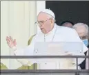  ?? ALESSANDRA TARANTINO — THE ASSOCIATED PRESS ?? Pope Francis appears on a balcony of the Agostino Gemelli Polyclinic in Rome on Sunday where he is recovering from intestinal surgery. He gave the traditiona­l Sunday blessing and Angelus prayer.