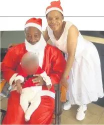  ??  ?? Snapshots from the Moyane family album show, left, proud grandparen­ts Tom Moyane and Thandi Moyane with their grandson at Christmas and, right, Hlekani Moyane with his partner and their son. Tom Moyane has been accused of assaulting the child’s mother.