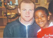  ??  ?? Future star: Wayne Rooney with Angel Gomes in 2007