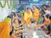  ??  ?? Mayor Alok Sharma serves food at the launch of Deendayal Rasoi Yojana in Bhopal and (right) BJP national president Amit Shah pays tributes to Dr Syama Prasad Mookerjee and Pt Deendayal Upadhyaya in Rohtak.