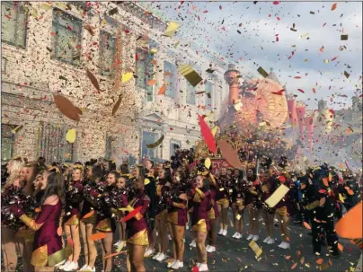  ?? The Associated Press ?? GUSTY FALL DAY: Confetti flies at the start of the Macy’s Thanksgivi­ng Day Parade on Thursday in New York.