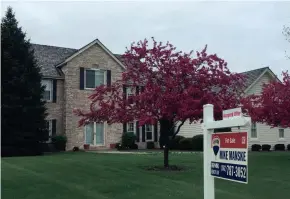  ?? PAUL GORES / MILWAUKEE JOURNAL SENTINEL ?? The demand for houses in Wisconsin remains strong. This home in Brookfield had an accepted offer sign out front on Sunday.