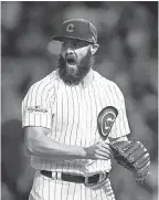  ?? JIM YOUNG/USA TODAY SPORTS ?? Jake Arrieta is expected to provide a good example for Philadelph­ia’s younger players.