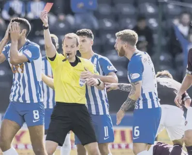  ??  ?? 2 Clockwise from far left: Aberdeen captain Graeme Shinnie harangues Andrew Dallas during the Betfred Cup final; Willie Collum shows the red card to Kilmarnock’s Gary Dicker against Hearts; referee Kevin Clancy was criticised for sending off Alfredo Morelos on the opening weekend of the season; and Morelos’ offside goal against Hearts.