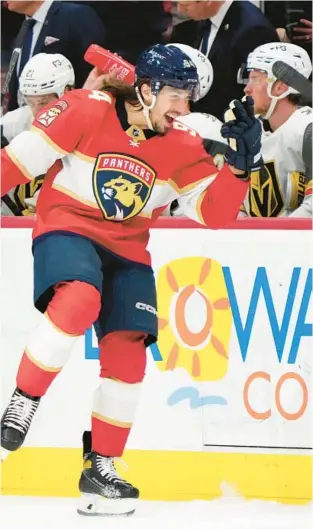  ?? WILFREDO LEE/AP ?? Panthers left wing Ryan Lomberg celebrates after scoring during the first period against the Vegas Golden Knights on Tuesday in Sunrise.