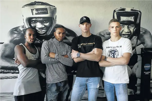  ?? Picture: Alon Skuy ?? FELLOWSHIP OF THE RING Brothers Ricardo and Charlton Malajika, left, and Tristan and Cayden Truter have found honour and purpose in the sport of boxing.