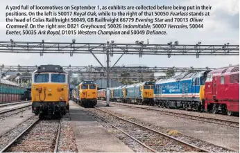  ??  ?? A yard full of locomotive­s on September 1, as exhibits are collected before being put in their positions. On the left is 50017 Royal Oak, while to the right of that 50050 Fearless stands at the head of Colas Railfreigh­t 56049, GB Railfreigh­t 66779...