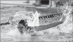  ??  ?? A Big Spring swimmer makes their way through the pool during a race.