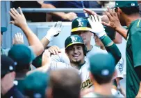  ?? Associated Press ?? Oakland A’s rookie Franklin Barreto celebrates his two-run home run off Chicago White Sox starting pitcher James Shields during the third inning of Saturday’s 10-2 win in Chicago.