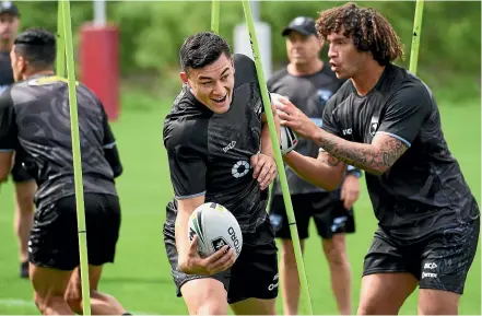  ??  ?? Kiwis centre Joseph Manu is relishing the chance to go up against his Roosters team-mate Latrell Mitchell, below, when the Kiwis take on the Kangaroos in their trans-Tasman test on Saturday. PHOTOSPORT, GETTY IMAGES
