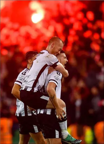  ??  ?? Patrick McEleney (right) and Chris Shields of Dundalk celebrate at the final whistle.