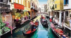 ??  ?? Ride on a gondola in Venice, Italy.