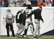  ?? RJ SANGOSTI — THE DENVER POST ?? Las Vegas Raiders wide receiver Jakobi Meyers is helped off the field after getting hurt during the NFL Week 1 match up against the Denver Broncos at Empower Field at Mile High in Denver on Sunday.