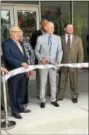  ?? BRIAN MCCULLOUGH – DIGITAL FIRST MEDIA ?? Franklin Mint Federal Credit Union President and CEO John D. Unangst cuts the ribbon Wednesday on the company’s new headquarte­rs in Chadds Ford.