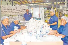  ?? Picture: SUPPLIED ?? Staff members pack toilet tissue at the factory.