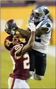  ?? SUSAN WALSH - AP ?? Washington cornerback Kendall Fuller (29) stops Panthers wide receiver D.J. Moore (12) from making a catch during the second half of an NFL game, Sunday, in Landover, Md.