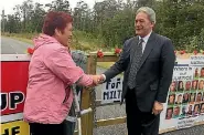  ?? PHOTO: JOANNE CARROLL/STUFF ?? Pike River widow Anna Osborne and NZ First leader Winston Peters at Pike River mine gates in January.