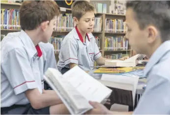  ?? Antonie Robertson / The National ?? A report says only 55 per cent of private school pupils in Dubai read for pleasure but at Ranches Primary School, above, teachers actively encourage a love of reading