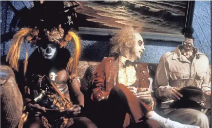  ?? WARNER BROS. ?? Betelgeuse (Michael Keaton) in the afterlife waiting room in 1988’s “Beetlejuic­e.”