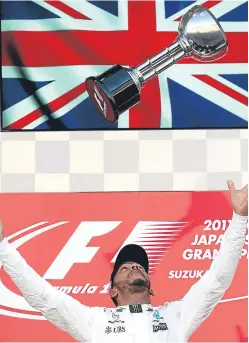  ?? Picture: Getty Images. ?? Lewis Hamilton on the podium in Austin as he celebrates his US GP victory, leaving him on the brink of a fourth world championsh­ip.