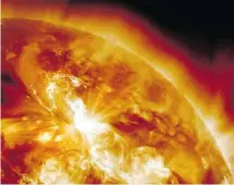  ?? NASA/AFP/GETTY IMAGES ?? A solar flare, such as the one shown in this image from January 2012, could destroy global communicat­ions. But the truth is that many of the threats faced by our planet are remain poorly understood.