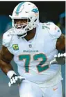  ?? DOUG MURRAY/AP ?? Dolphins’ Terron Armstead runs onto the field before facing the Texans on Nov. 27 in Miami Gardens.