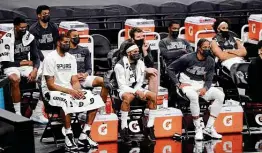  ?? Billy Calzada / Staff photograph­er ?? Lamarcus Aldridge, front left, Patty Mills, center, and Demar Derozan left in 2021. Aldridge and Mills are with the Nets, while Derozan is with the Bulls.