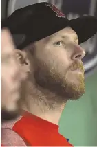  ?? STAFF PHOTO BY CHRISTOPHE­R EVANS ?? AILING ACE: Chris Sale, now on the 10-day DL with a sore shoulder, sits in the dugout last night.