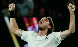  ?? ?? Stefanos Tsitsipas celebrates coming out on top in five- set thriller