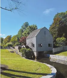  ?? HERALD PHoToS BY MoIRA MCCARTHY ?? DAILY GRIND: A water wheel powers Dexter Grist Mill, above. A quaintly painted mailbox, left, announces Dunbar House Restaurant &amp; Tea Room.