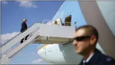  ?? PATRICK SEMANSKY — AP ?? President Donald Trump boards Air Force One at Andrews Air Force Base, Md., Friday. Trump is scheduled to spend the weekend at Trump National Golf Club in Bedminster, N.J.